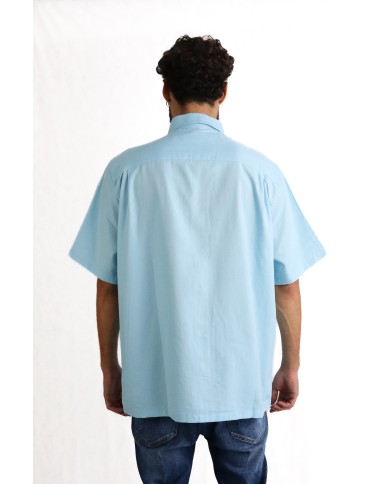 Camicia a maniche corte Louis Vuitton con ricamo logo centrale celeste Camicia a maniche corte Louis Vuitton con ricamo logo centrale celeste