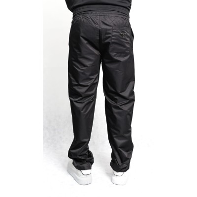 Pantalone nero con placca logo Prada